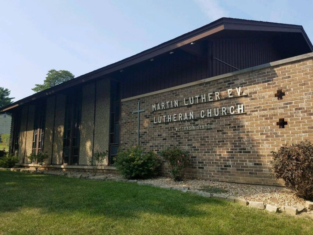 Martin Luther Evangelical Lutheran Church building with name and synod.